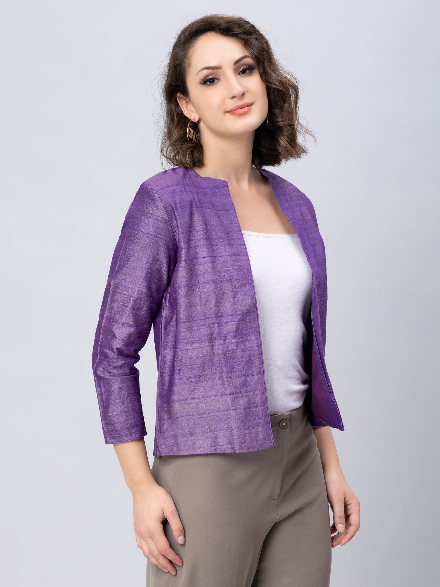A picture of Purple Pure Tussar Blazer, womens workwear standing against a grey background looking sideways