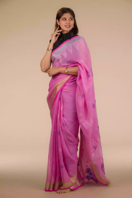 A lady in Dark Pink Jamdani hand weaving In Pure Linen Saree, womens workwear standing against a beige background