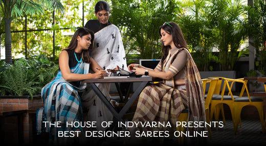 A picture of three women wearing beautiful Indvarna designer sarees showcasing formal dress for women