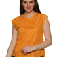 A model in Cotton Drop Shoulder Orange Top, a womens workwear is standing against a white background