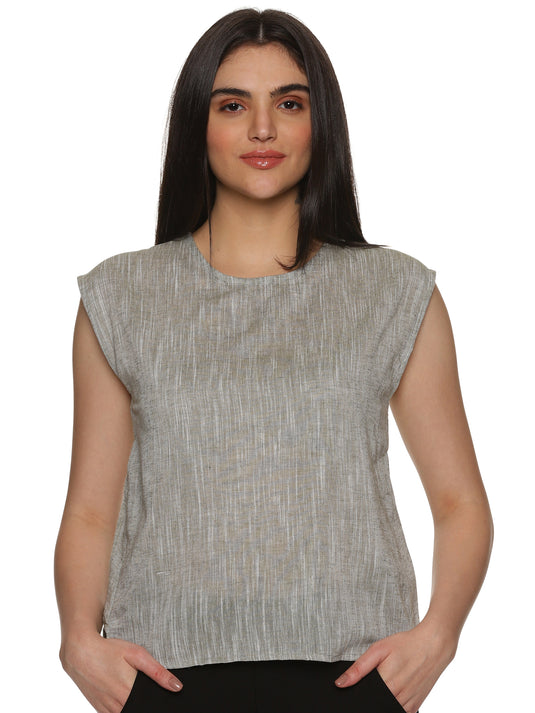 A model in Cotton Drop Shoulder Khadi Grey Top, a womens workwear is standing against a white background