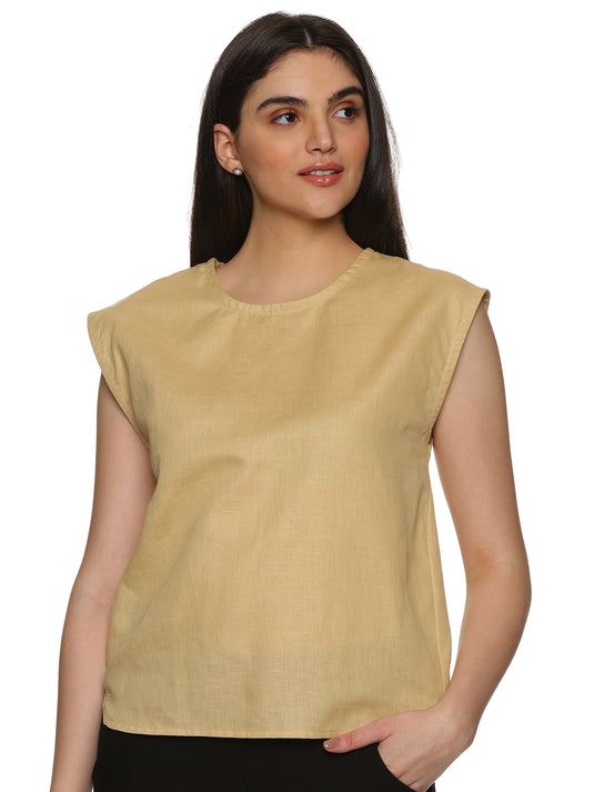 A model in Cotton Drop Shoulder Beige Top, a womens workwear is standing against a white background