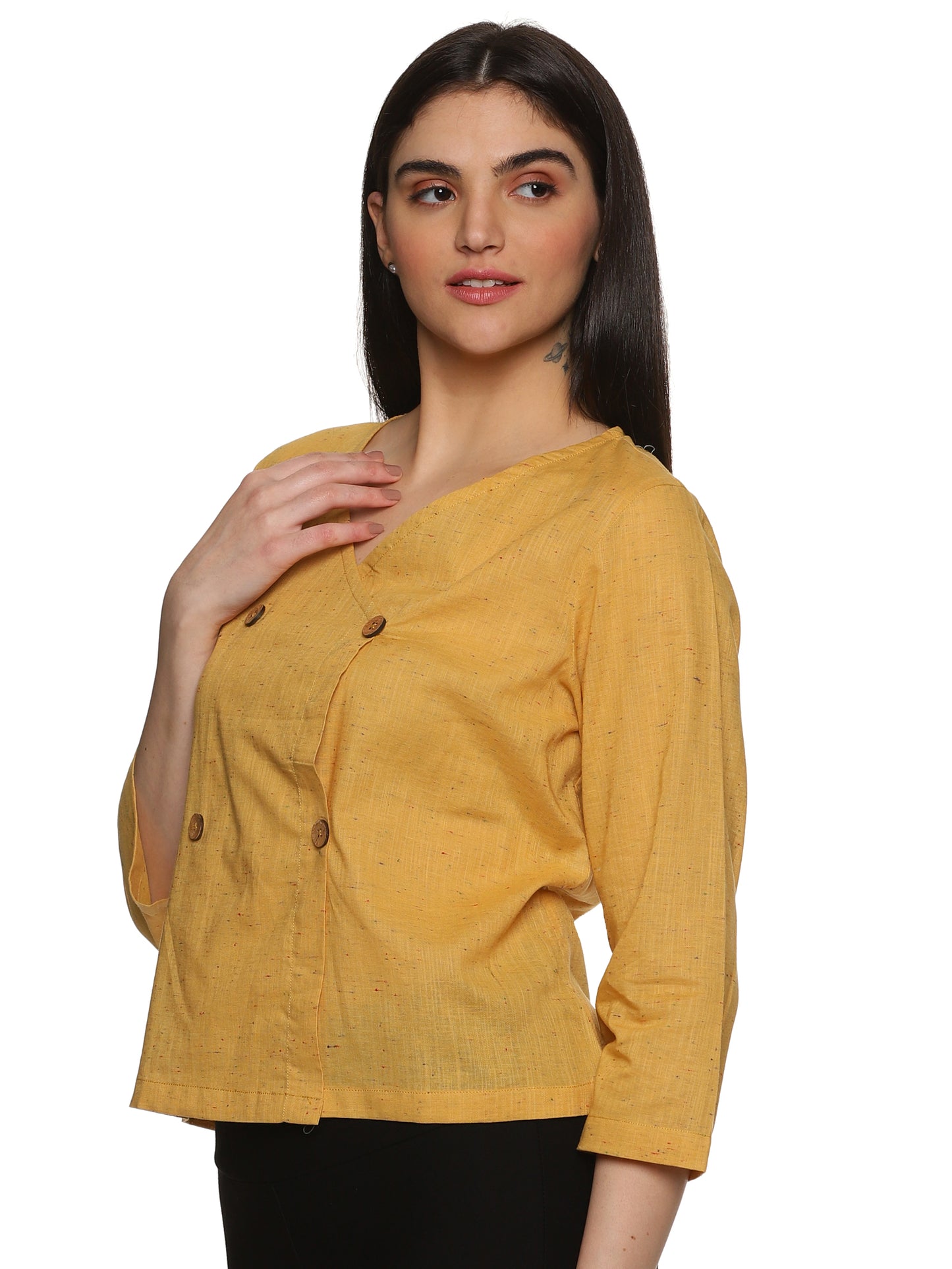 A side profile of lady in Mustard Asymmetric Neck Side Button Top, womens workwear 