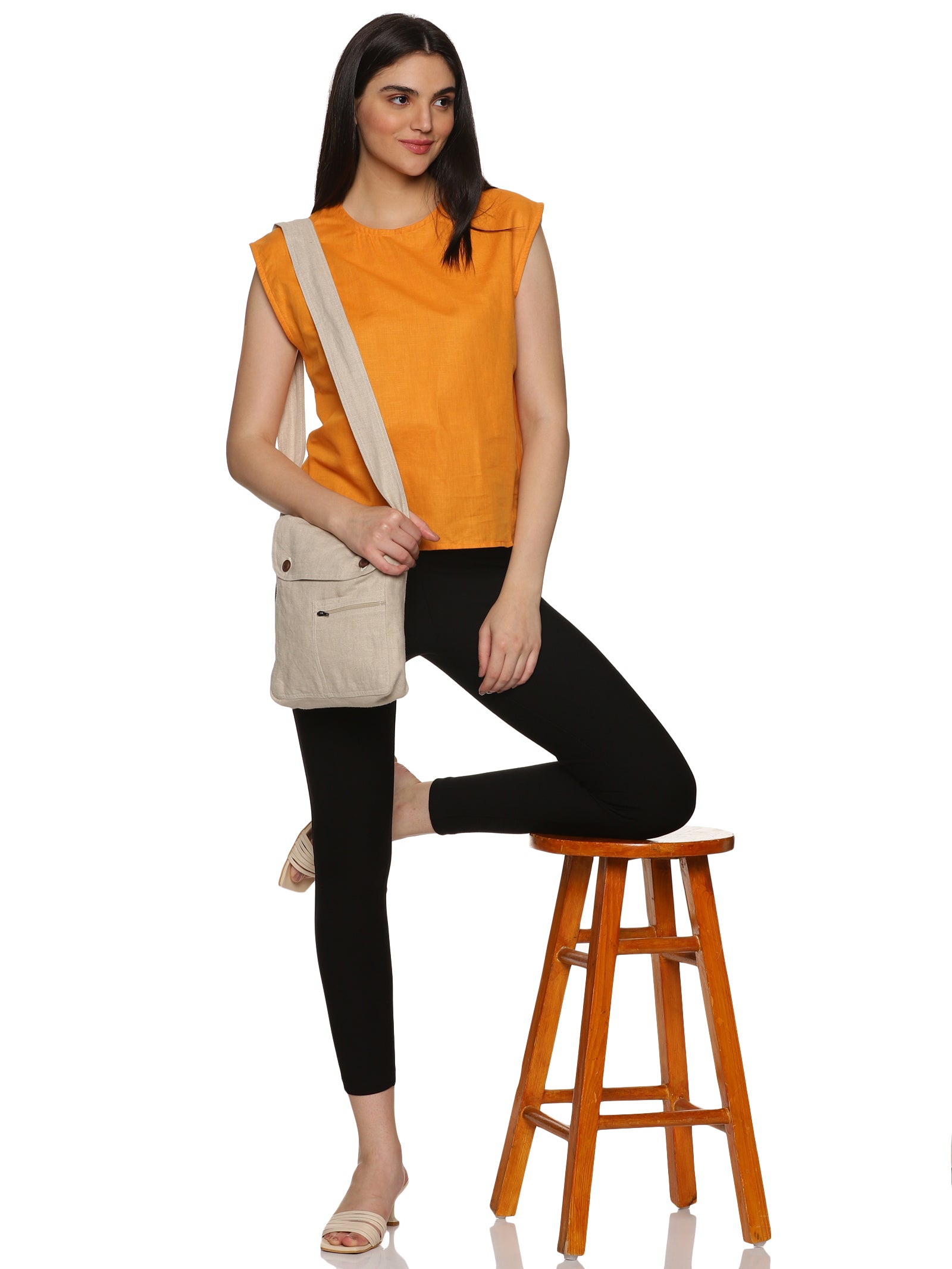 An aesthetic image of Cotton Drop Shoulder orange Top, womens workwear