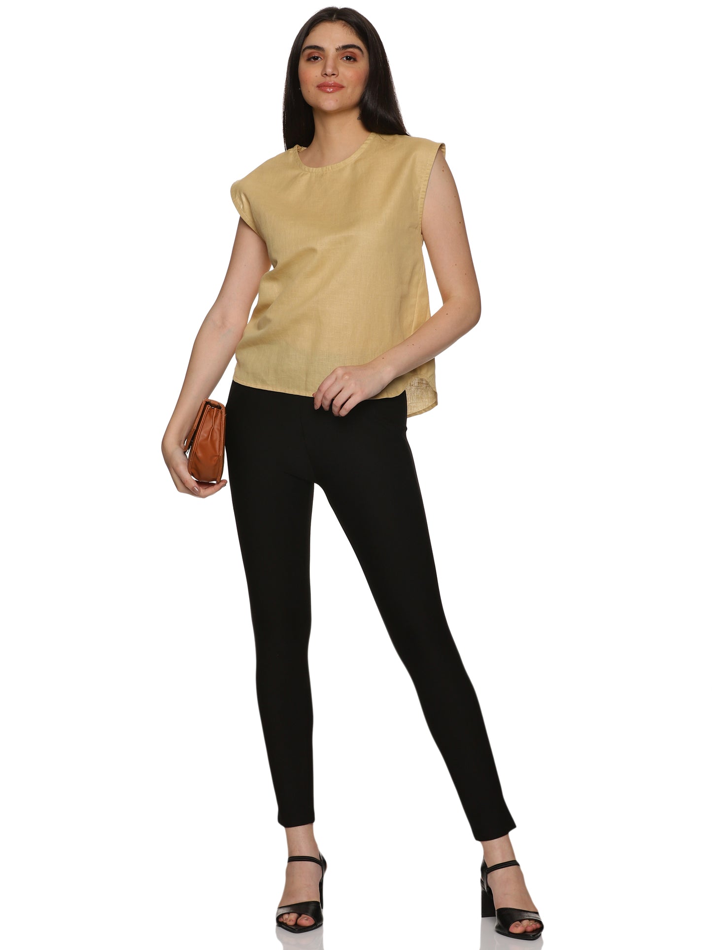 A zoomed out view of lady in Cotton Drop Shoulder Beige Top, womens workwear 