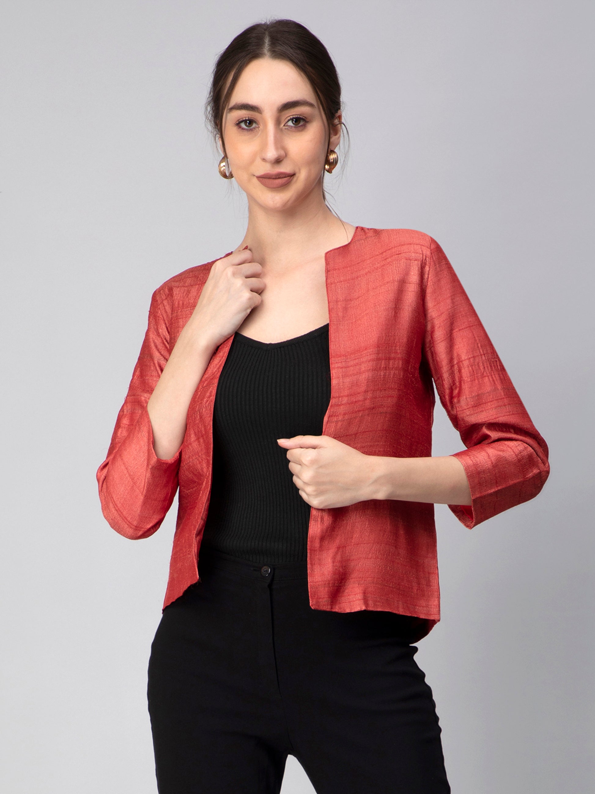 A picture of  Earthy RED Pure Tussar Blazer, womens workwear standing against a grey background looking sideways