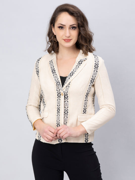 A zoomed version Elegant Black And White Blazer In Jute Cotton, womens workwear standing against a grey background 