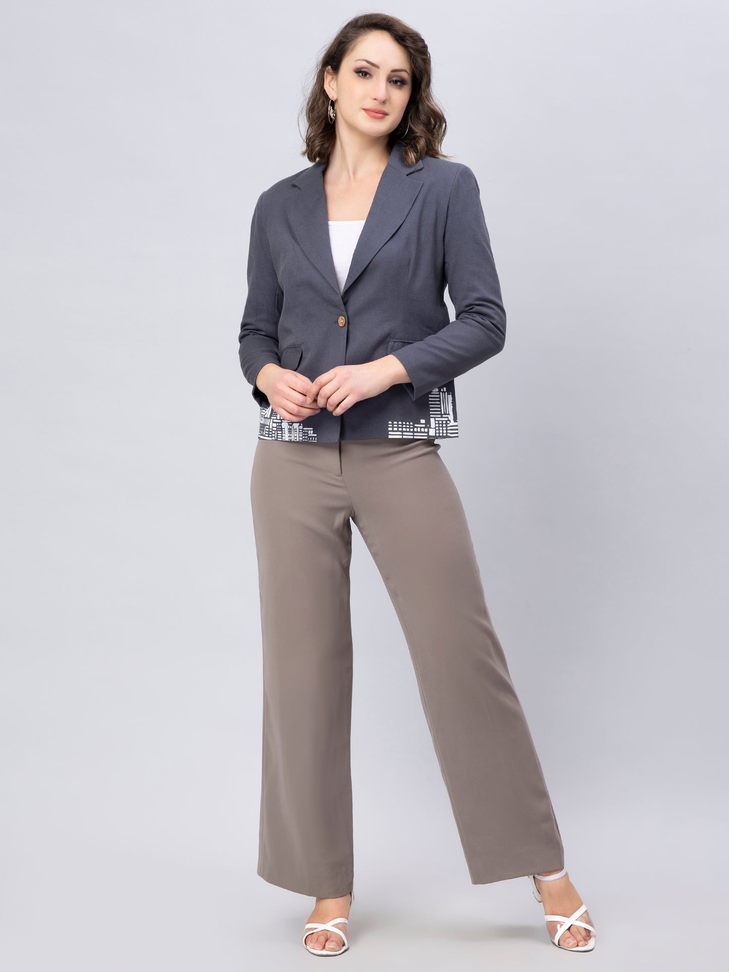 A full length view of lady in Stylish Grey Blazer with Modern Motif, womens workwear