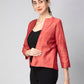 A lady in Earthy RED Pure Tussar Blazer, womens workwear standing against a tan background