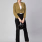 A lady in Green Blazer In Pure Cotton, womens workwear standing against a tan background looking down