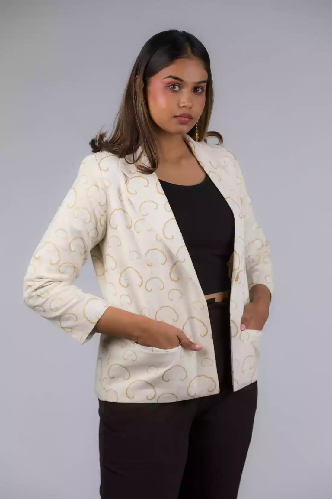 A Women in White Gold Tree Blazer In Pure Cotton, womens workwear standing against a grey background