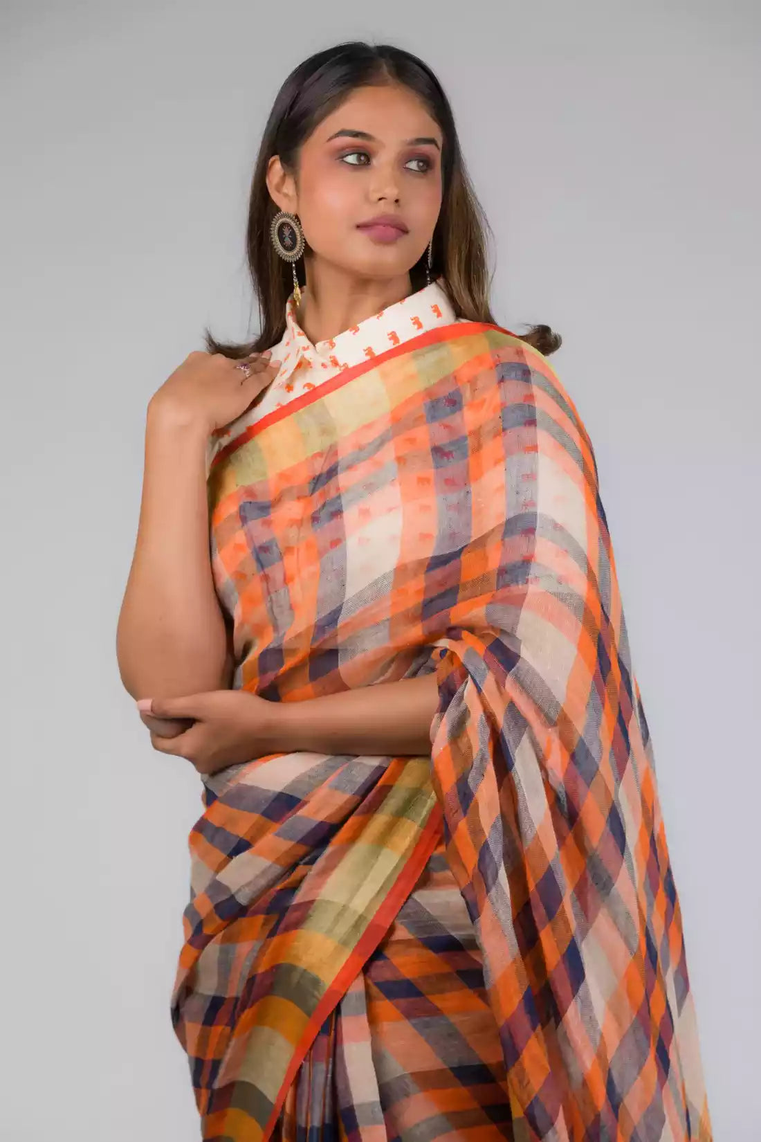 A pretty lady in Linen By Linen Rustic Saree in Beige Checks, a office wear for women