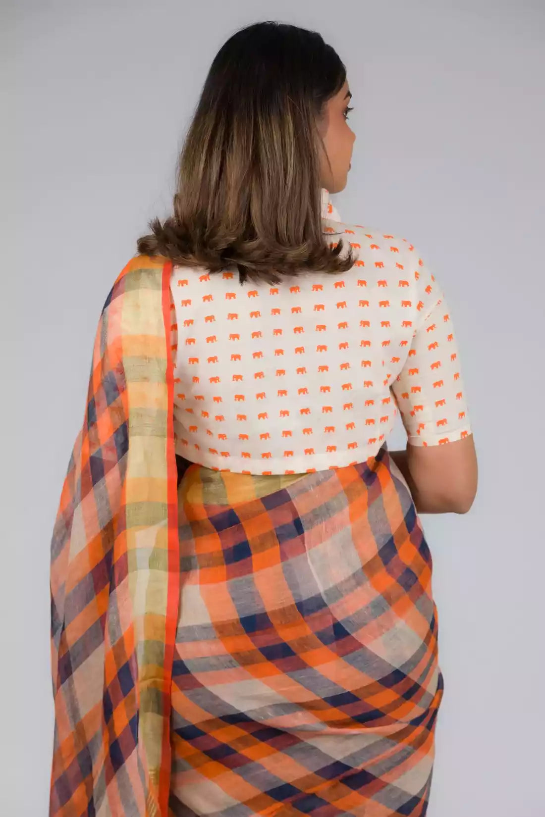 This is the view from back of Linen By Linen Rustic Saree in Beige Checks, formal office wear for women