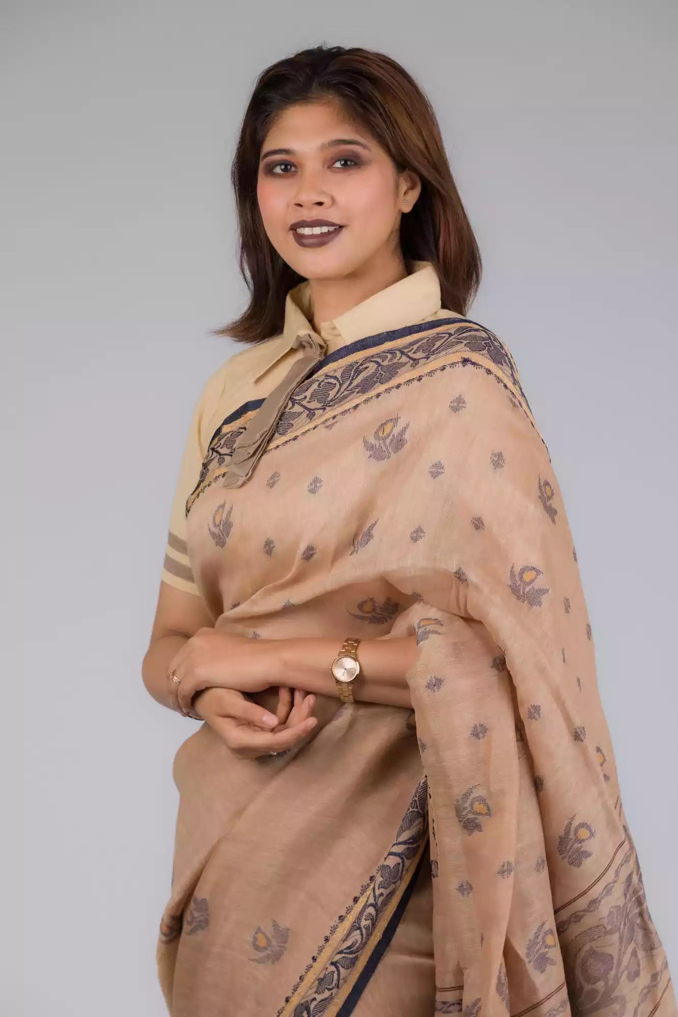 A gorgeous picture of lady in Handwoven Soft Linen Cotton Saree in Beige and Black, womens workwear  
