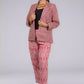 A picture of Pink Woven Ikkat bottom In Pure Cotton, womens workwear standing against a grey background looking sideways