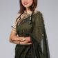 A model in Baluchari Pure Cotton Saree in Algae Green a womens workwear is standing against a grey background