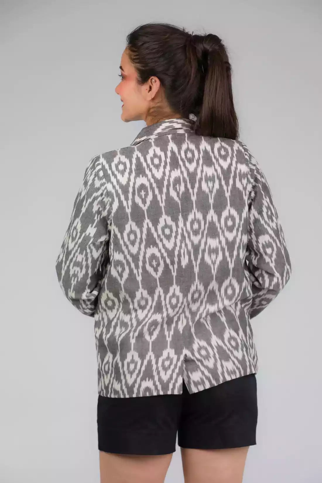 The view from back of Grey Woven Ikkat Blazer In Pure Cotton, formal office wear for women