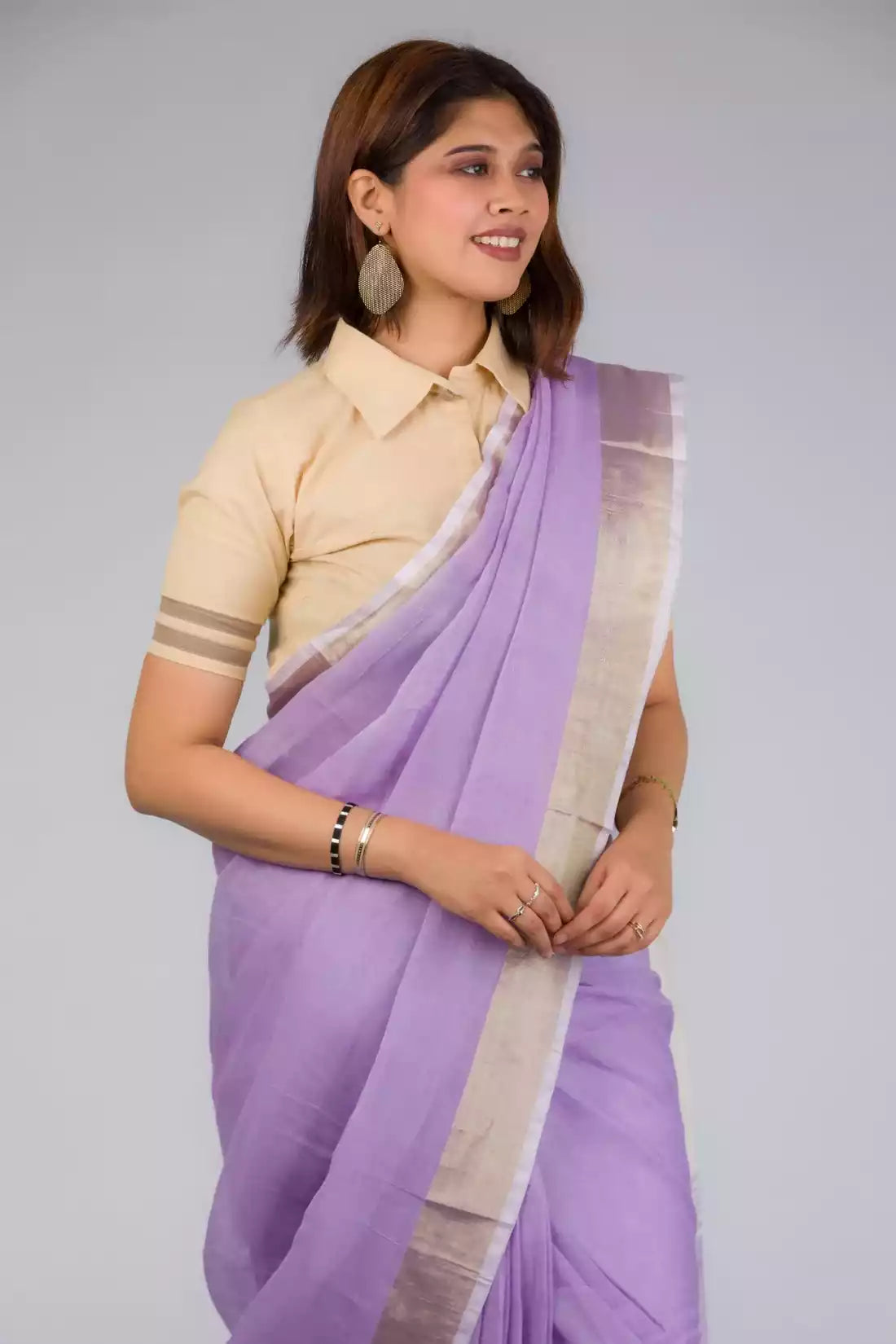 A pretty lady in Lilac Blush Linen Saree, a office wear for women