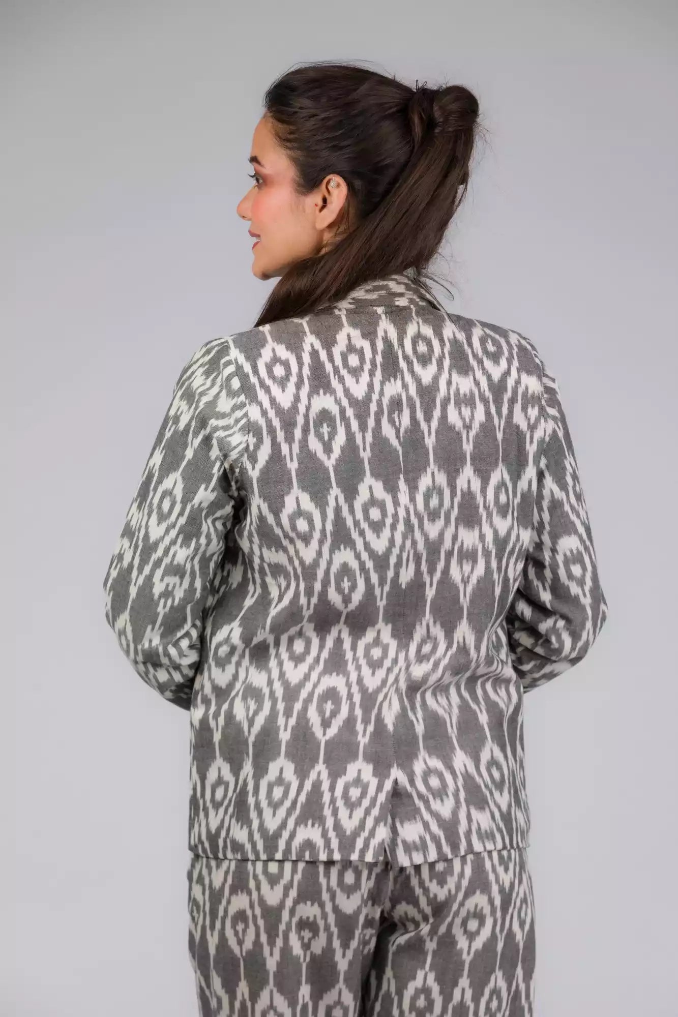 The view from back of Grey Woven Ikkat bottom In Pure Cotton, formal office wear for women