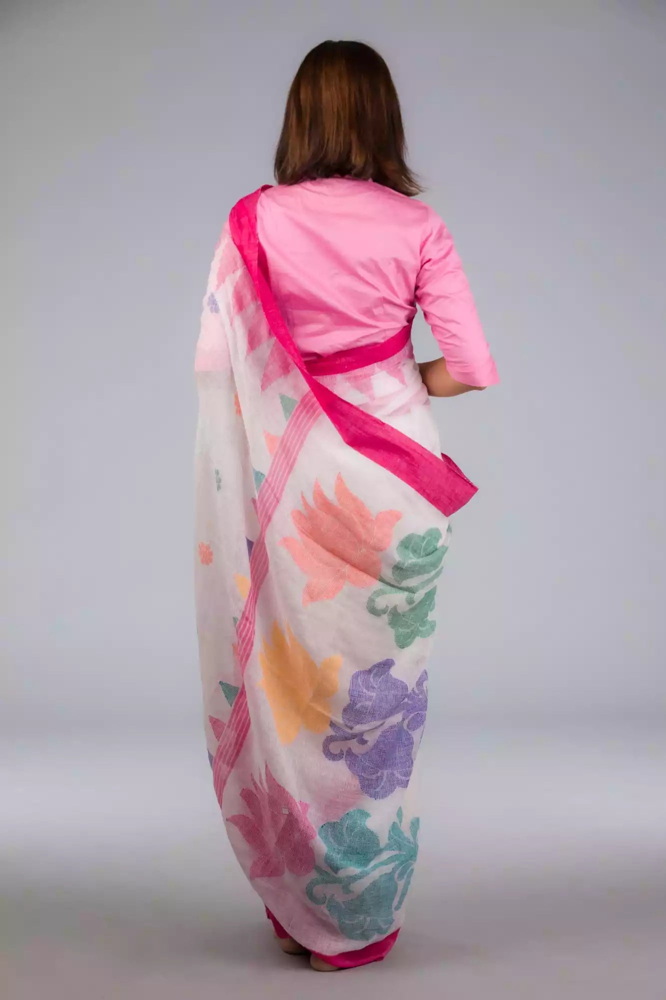 A beautiful back view of lady in Fuchsia Pink & Dovetail White Jamdani Work Saree, womens workwear 