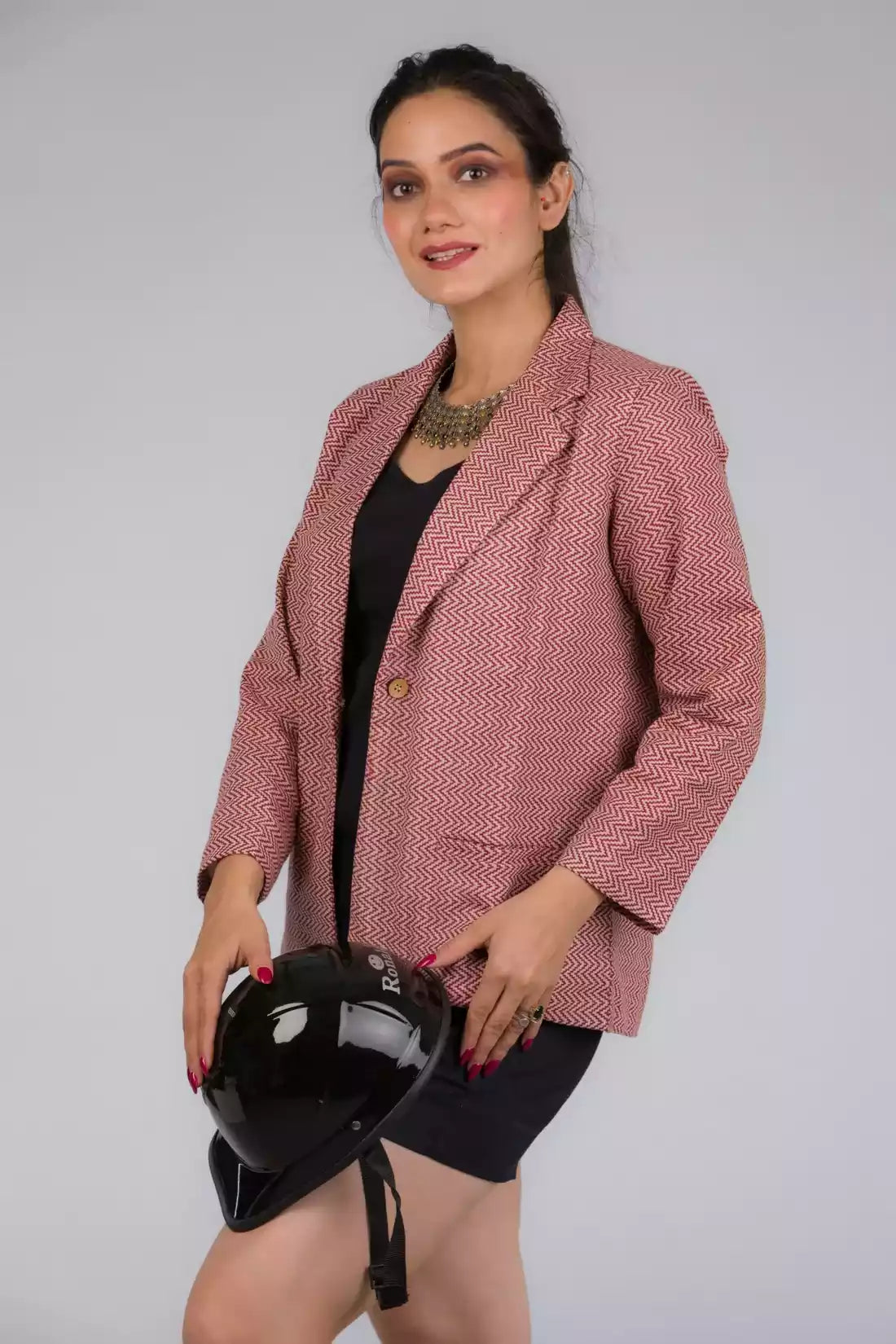 A Women in Chevron Red Blazer In Pure Cotton, womens workwear standing against a grey background