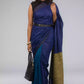 A zoomed out view of women wearing a Hues of Space Blue and Cobalt Blue Linen Woven Saree with Patli Pallu, formal dress for women