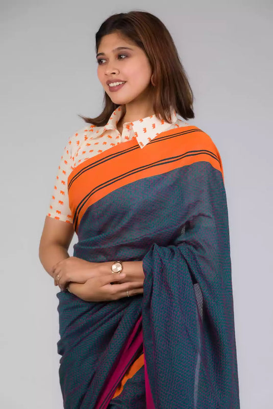 The woman in picture is wearing workwear for woman saree, Grey - Orange &pink border with black jamdani pallu In Pure Cotton Saree
