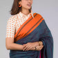 This is image of formal office wear saree which is in Grey - Orange &pink border with black jamdani pallu In Pure Cotton Saree
