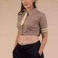 A Women in Beauty in Beige Cotton Tie Blouse in Light Brown (Removable Tie), womens workwear standing against a beige background