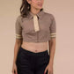 A Women in Beauty in Beige Cotton Tie Blouse in Light Brown (Removable Tie), womens workwear standing against a beige background looking sideways