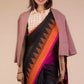 This the portrait of lady in Black with Orange and pink border Jamdani hand weaving Saree with formal blazer for women