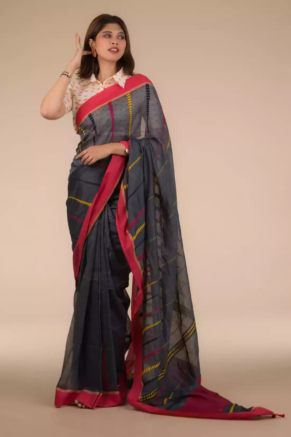 a woman looking sideways wearing formal workwear Grey and Pink border Pure Cotton Saree