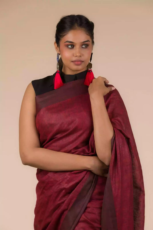 An aesthetic image of lady in Earthy Brown Pure Linen Saree with Maroon Pleats and Anchal, womens workwear 