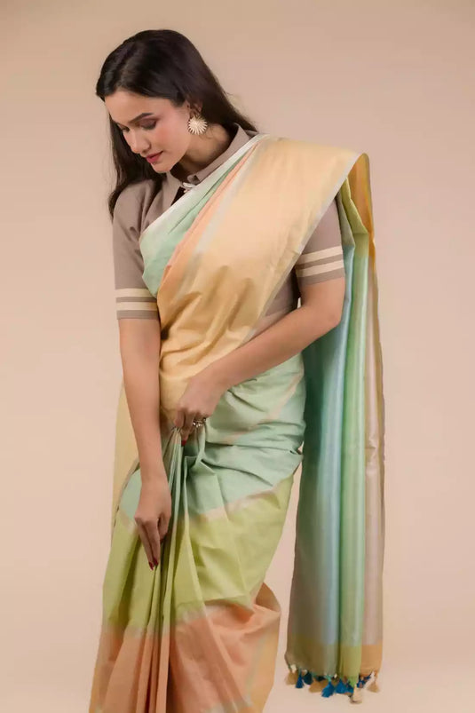 a woman looking downwards wearing formal workwear Casual Horizontal stripes Multicolor Cotton Saree