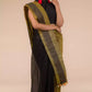 An aesthetic image of lady in Black Pure Linen Saree with Tints of Mustard, womens workwear 