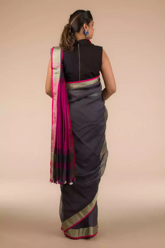 A beautiful back view of lady in Refined Dusk Linen Saree in Steel-Grey, womens workwear