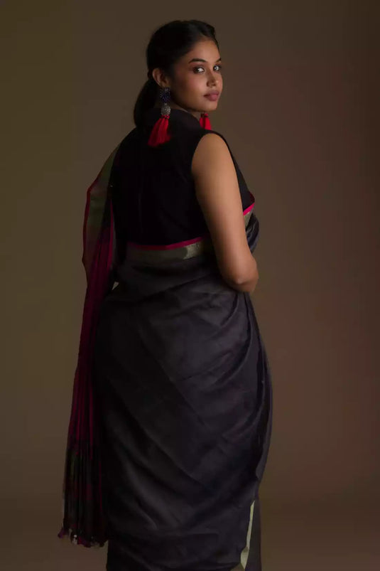 A zoomed out view of lady in Refined Dusk Linen Saree in Steel-Grey, womens workwear
