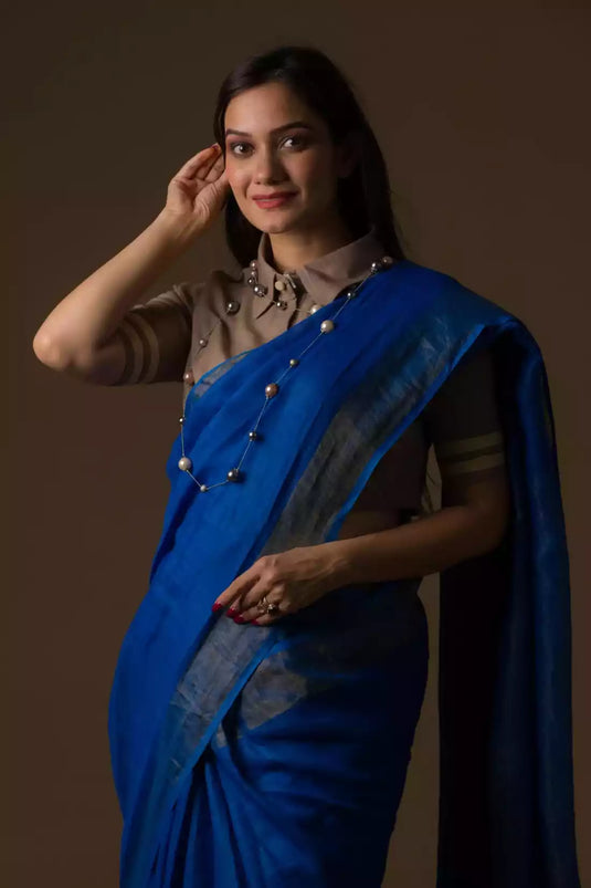 A gorgeous picture of lady in Indy Pure Linen Saree in Royal Blue, womens workwear  