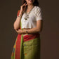 This is a beautiful  image of formal office wear saree which is in Parrot Green Jamdani Pure Linen Saree