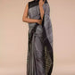 a woman looking sideways wearing formal workwear Grey With Pure Cotton Saree