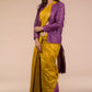  This is image of formal office wear saree which is in Mustard with purple border Plain In Pure Tussar with Ghicha Border Saree which is worn with a blazer