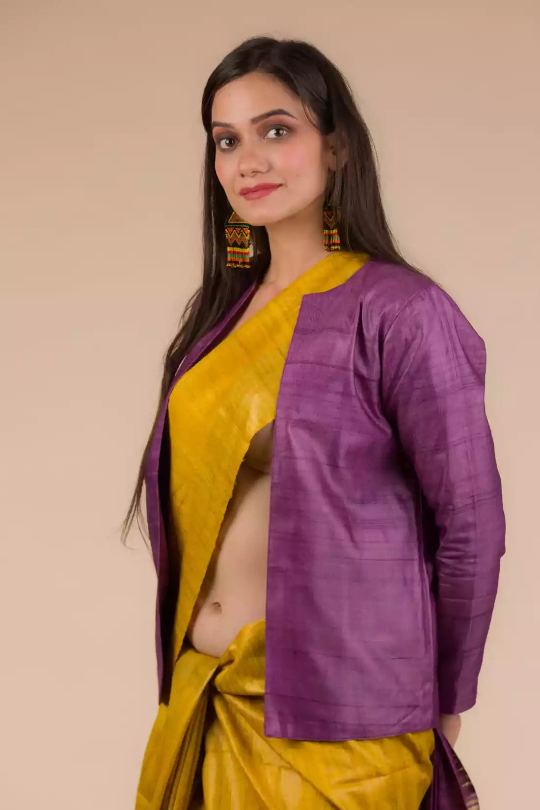 The woman in picture is wearing workwear for woman saree