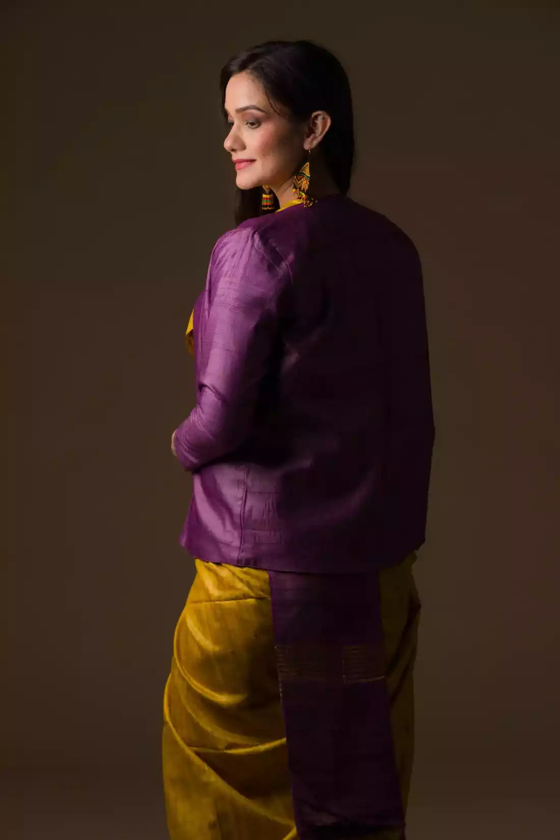 This is view from back of the Mustard with purple border Plain In Pure Tussar with Ghicha Border Saree, formal office wear for women