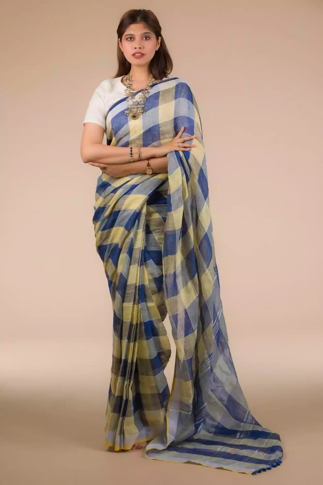 An aesthetic image of lady in Pure Linen Dark Blue Saree with Tan Brown and Lemon Yellow Checks, womens workwear 