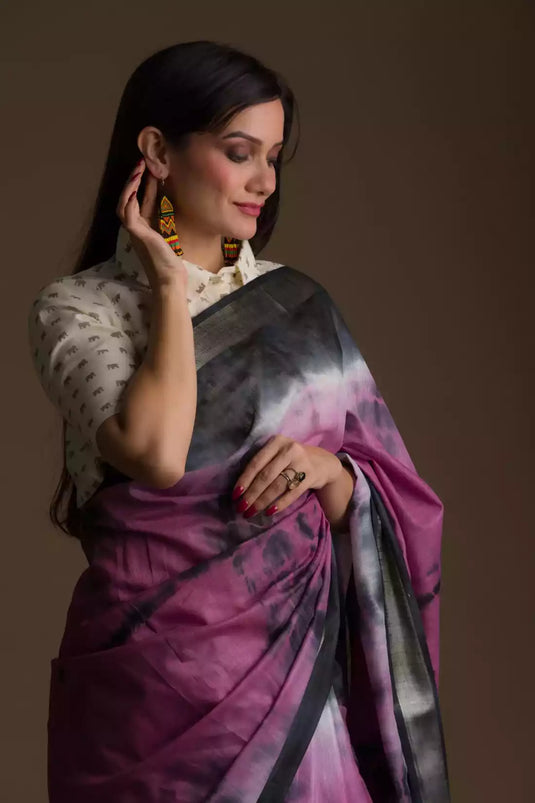 a woman looking sideways wearing formal workwear for women which is Shibori Cotton Viscose Saree