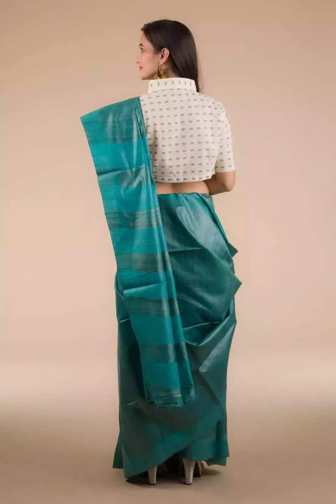 This is view from back of the Sea green Plain In Pure Tussar Saree, formal office wear for women