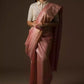 A beautiful lady in Dusty Rose Plain In Tussar Munga Saree, a office wear for women