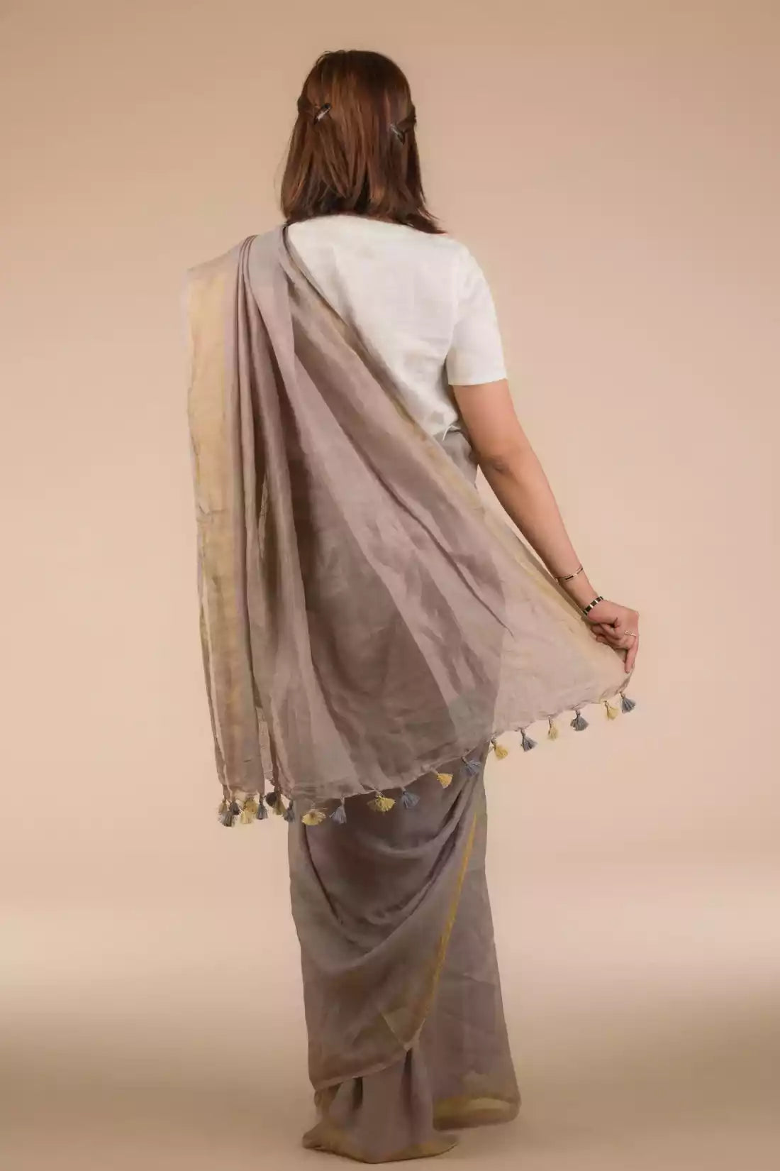 This is view from back of the Fossil Grey Plain in Pure Linen Saree, formal office wear for women