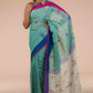 A beautiful lady in Light sea green Jamdani hand weaving In Pure Linen Saree, a office wear for women