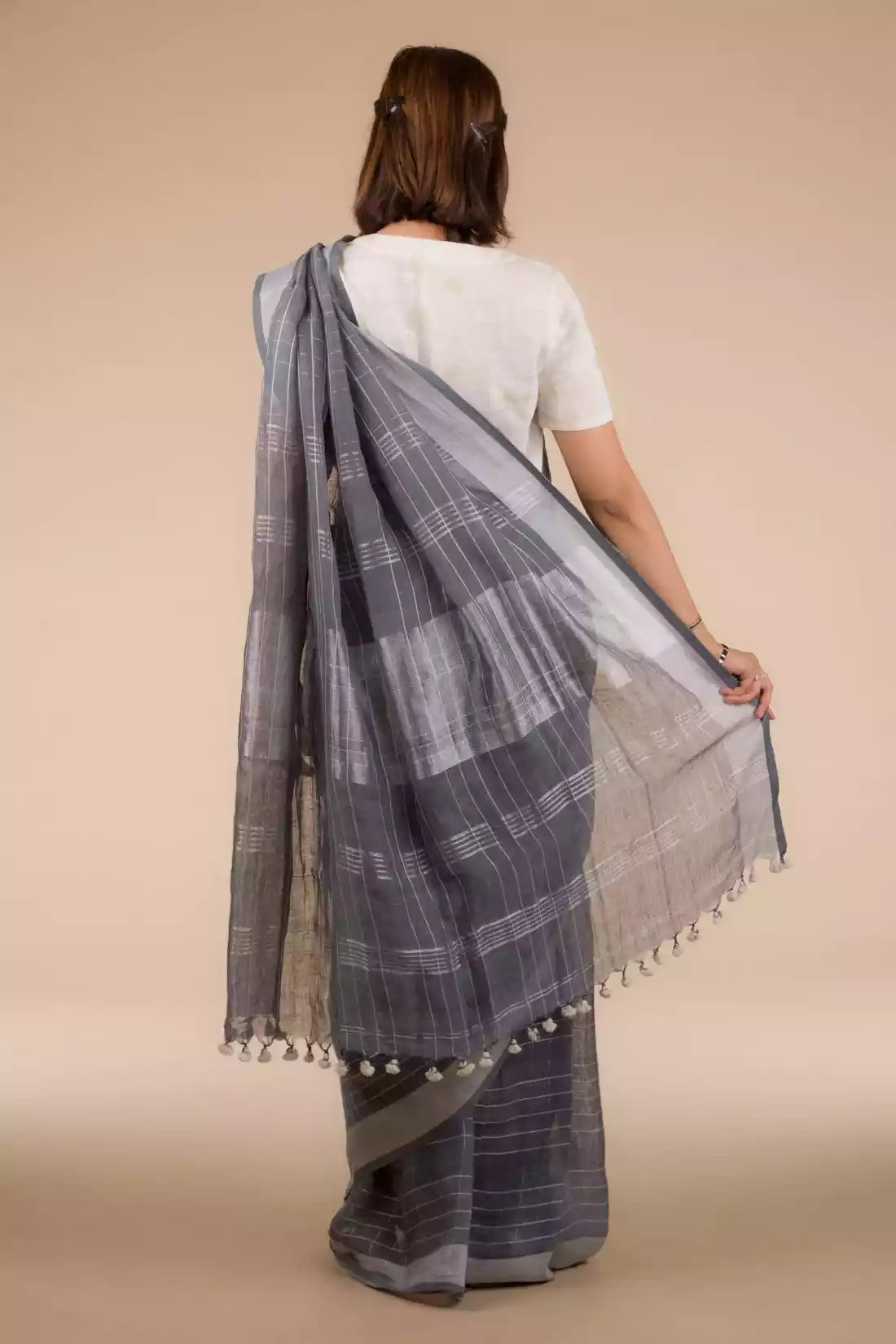 This is view from back of the grey check saree